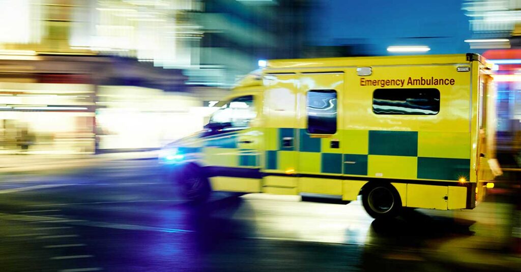 Ambulance car moving at night